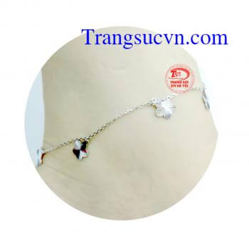 Lắc chân vàng tây 14k, vàng trắng. Thiết kế hình bông hoa đơn giản. Dễ phối đồ khi diện.