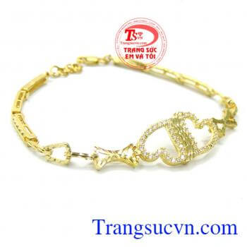 Bán sản phẩm lắc tay vàng đá quý chế tác kiểu trái tim đôi chung tình ngọt ngào cho phái nữ.
