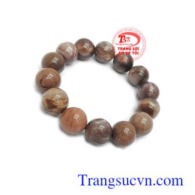 Chuỗi tay gỗ hóa thạch bình an 14 ly mang nguồn năng lượng dương tích cực mạnh mẽ, nó có thể trấn áp lại năng lượng âm